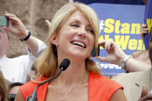 Democratic Senators Wendy Davis and Royce West at a protest before the start of a special session of the Texas legislature in Austin, Texas