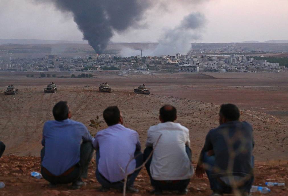 Smoke rises from the clashes in Ayn al-Arab